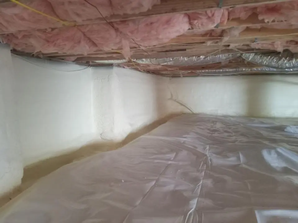 Crawl space encapsulation with closed-cell spray foam for Commercial Roof Restoration in Hopewell